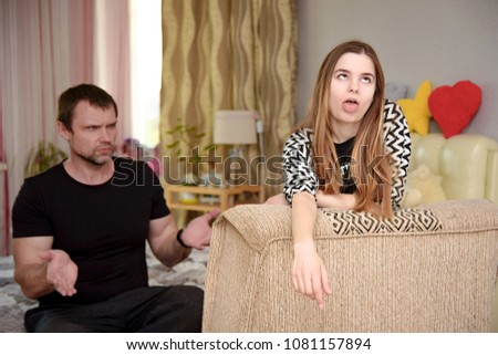 difficult relationship between the father and the daughter of a teenager. A father scolds a teenager's daughter while she is in her room - she does not want to listen to him.