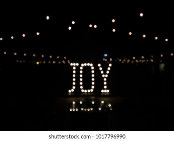 Diffused light lettering: Joy