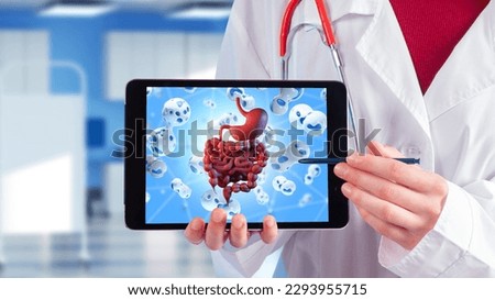 Digestive system. Tablet in hands of doctor. Probiotics for digestion. Gastrointestinal tract on display. Probiotics for stomach. Microbiota of digestive system. Medicine and healthcare Stock foto © 