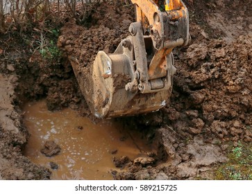 Digging Due To The Bursting Of Water Pipes With Excavator