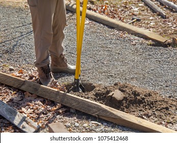 Digging A Hole For A Post And Fence.