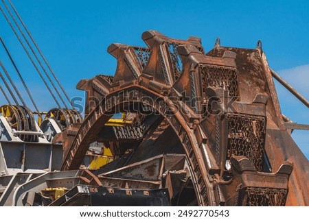 Digging machine, coal mining machine, huge mining equipment. metal machine for mining non-ecological coal. pile of metal, scrap. driving ropes, control cabin