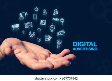 Digital Advertising Blue Word Glowing Icon Floating Over Open Hand On Dark Blue Background,online Payment,Digital Marketing Concept.
