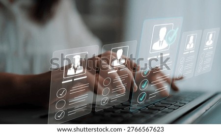 Digital Application Process with Candidate Profiles Displayed on a Laptop Screen in Modern Office Setting Emphasizing Technology and Recruitment Efficiency Sigmoid
