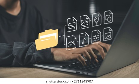 Digital archiving and file organization with document management systems (DMS). Hands typing on a laptop with digital folders and files organized storage, cataloging, and easy data retrieval.