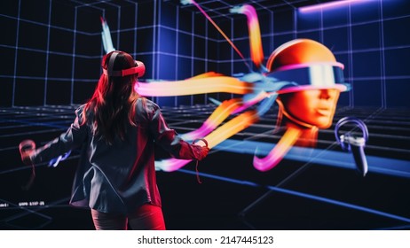 Digital Artist Using Virtual Reality 3D Software to Create a Beautiful Piece of Art in Interactive Creative Environment. Female Designer Using Virtual Reality Headset and Controllers for NFT Project.