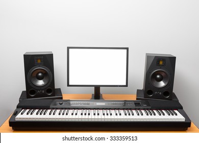 Digital Audio Workstation (daw) Studio With Electronic Piano And Monitor Speakers