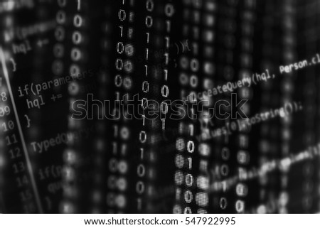 Digital binary data on computer screen. Close-up with small dept