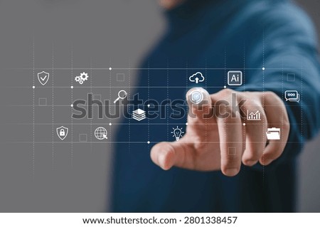 Digital business interface with hand selecting virtual icons, data analytics, AI, cloud computing and automation system. Technology integration, smart solutions and modern digital transformation.
