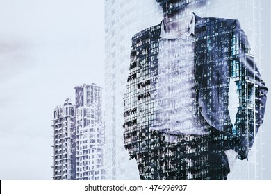 Digital Business Revolution Concept. Double Exposure Of Business Man Standing And Abstract Digital Coding On Building. Blue Tone.