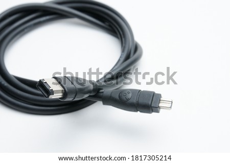 Digital cable with plugs standard DV, 1394 and ilink on isolated white background