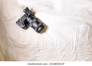Digital camera, in the background 