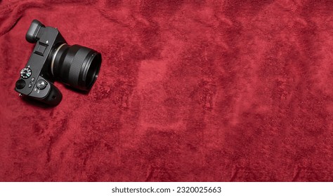 Digital camera, in the background 