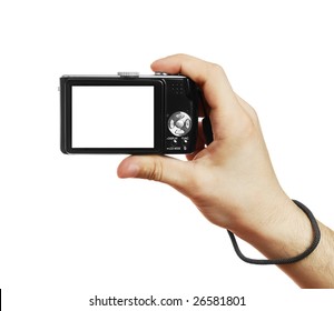 The Digital Camera In A Hand, Isolated On White