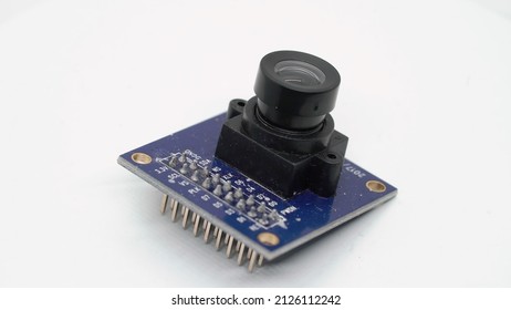 Digital camera lens IP security spy cam electronic component. Small single board computer, device for study at white isolated. Electronics diy robotics chip microcontroller board.