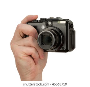 Digital Camera photo in a hand isolated on withe background - Powered by Shutterstock