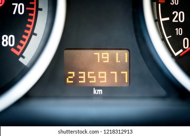 Digital Car Odometer In Dashboard. Used Vehicle With Mileage Meter. Numbers In Kilometers.