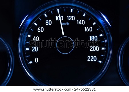 Digital car speedometer needle, high speed 100 kilometers per hour. Technology and transportation concepts