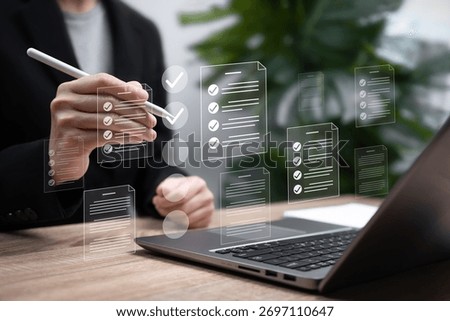 Digital Checklist and Document Management Concept, Businesswoman Use laptop and marks on Virtual Checklist for Workflow Planning, Productivity Improvement, Approval Process, and Project Tracking