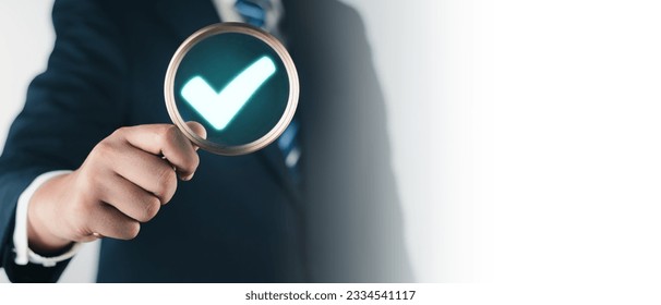 Digital Checklists, Rules of conduct rules and policies company, Regulations Terms and Conditions. Businessman holding magnifying glass and check mark icon, Show check the authenticity of the document
