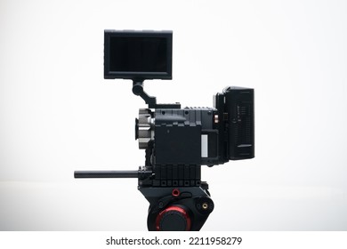 Digital Cinema Camera On A Tripod With PL Mount And No Lens White Background
