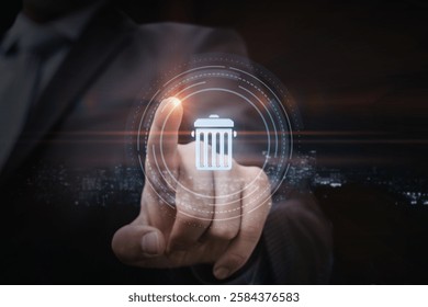 Digital cleaning and deletion. A man in a business suit clicks on a virtual Delete icon in the shape of a rubbish bin.