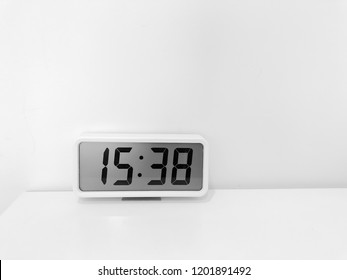 Digital Clock Display Time At Afternoon With White Background