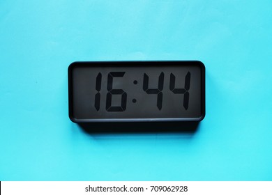 Digital Clock On Blue Background