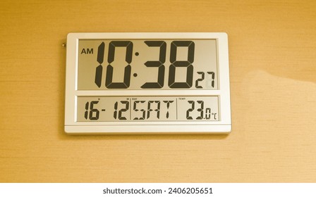 Digital clock on the wall. Digital electronic clock. - Powered by Shutterstock - Get 15% off with code: PIKWIZARD15