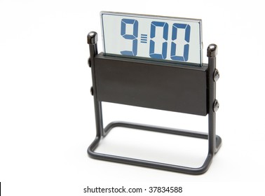 Digital clock on white background , 9:00