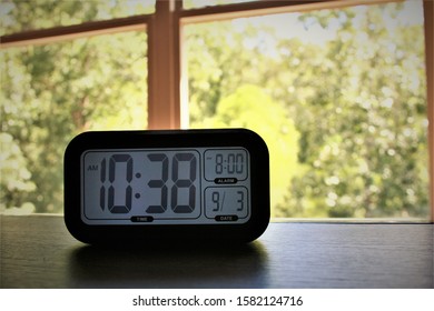 Digital clock sitting on a table
