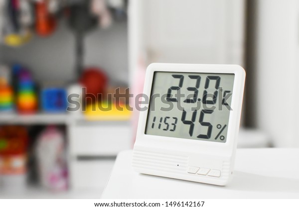 Digital clock, thermometer and  hygrometer for nursery\
or children room. 
