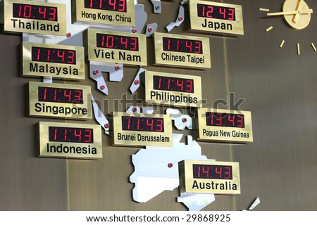 digital  clocks with different asian cities in a map
