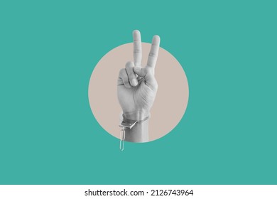 Digital Collage Modern Art. Hand Showing Peace Hand Sign, With Broken Handcuff