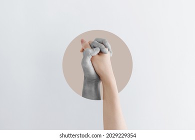 Digital collage modern art. Holding hand - Shutterstock ID 2029229354