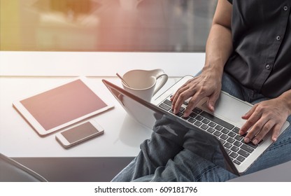 Digital communication lifestyle blog writer person using mobile smart device, or woman user typing on computer laptop working online via wireless internet technology, work from home  - Shutterstock ID 609181796