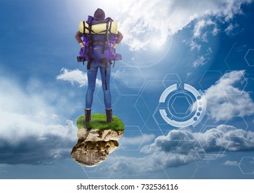 Digital composite of Adventurer lady with rucksack on floating rock platform with  interface in sky - Powered by Shutterstock - Get 15% off with code: PIKWIZARD15