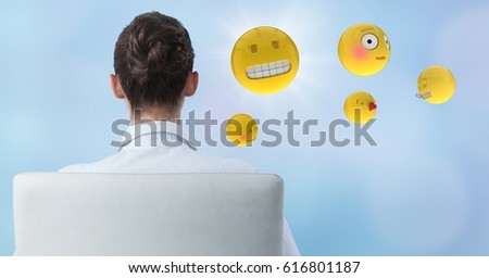 Digital composite of Back of business woman in chair with emojis and flare against blue background