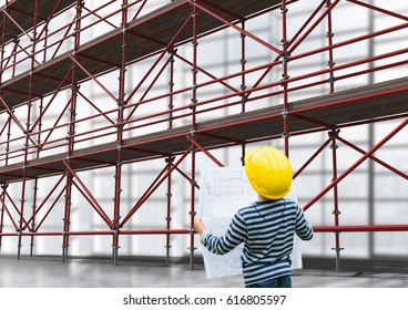 Digital composite of Boy looking 3D scaffolding - Powered by Shutterstock