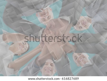 Digital composite of Business team putting hands together with maze graphic overlay and teal background