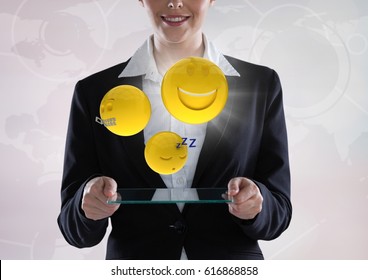 Digital composite of Business woman with glass device and emojis with flare against white interface - Powered by Shutterstock