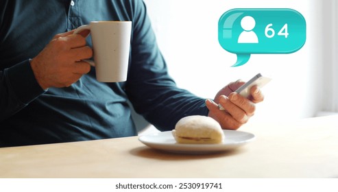 Digital composite of Caucasian man sitting at table with sandwich while holding cup of coffee and texting on mobile phone. In the foreground image of message bubble with follower icon and number count - Powered by Shutterstock