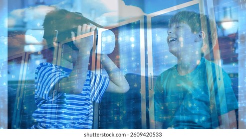 Digital composite of child using VR and laughing with a friend against animated background with server room