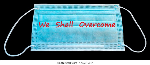 Digital Composite Conceptual Image Symbolizes Unprecedented Challenge Of 21 Century, Medical Mask With Text- We Shall Overcome - Mask Selected On Black Background