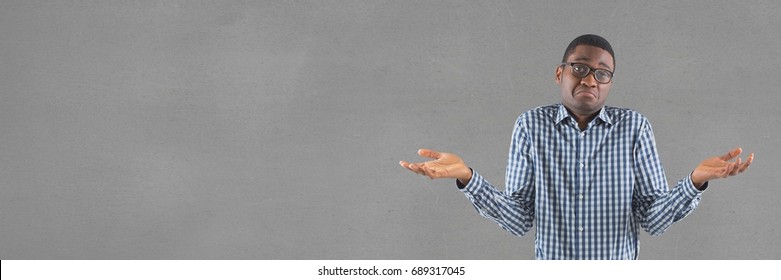 Digital composite of Confused man standing against wide blank grey