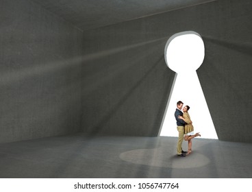 Digital composite of Couple embracing at keyhole shape doorway - Shutterstock ID 1056747764