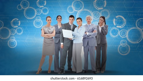 Digital composite of Digitally generated image of business people using laptop and smart phone against icons on blue back