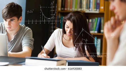 Digital composite of Digitally generated image of various geometric shapes with college students studying in library