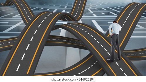 Digital composite of Digitally generated image of confused businessman standing on wavy road in sky - Powered by Shutterstock