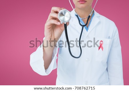 Digital composite of Doctor woman with breast cancer awareness ribbon